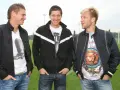 Trzech Polaków w Bundeslidze: Lewandowski, Błaszczykowski i Piszczek pozują na boisku.
