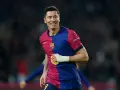 Robert Lewandowski w barwach Barcelony, jeden z najlepszych napastników świata, cieszy się po strzelonej bramce.