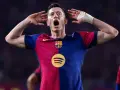 Robert Lewandowski, jeden z najlepszych strzelców Barcelony, świętuje bramkę.