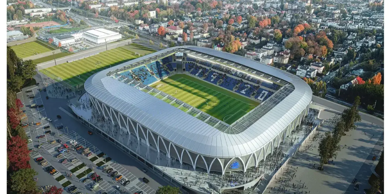 Nowy stadion Ruchu Chorzów w pełnej krasie, z trybunami, boiskiem i parkingiem.