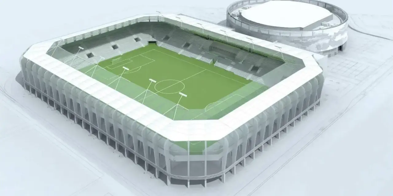 Nowoczesny stadion RKS Radomiak Radom z zieloną murawą i trybunami. Obok okrągły budynek.