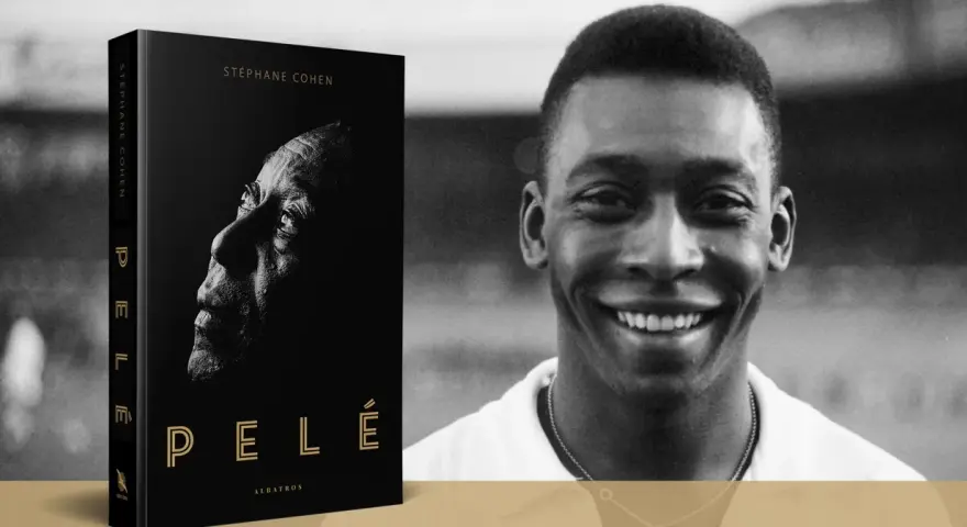 Książka "Pelé" Stéphane'a Cohena obok uśmiechniętego portretu legendy futbolu.
