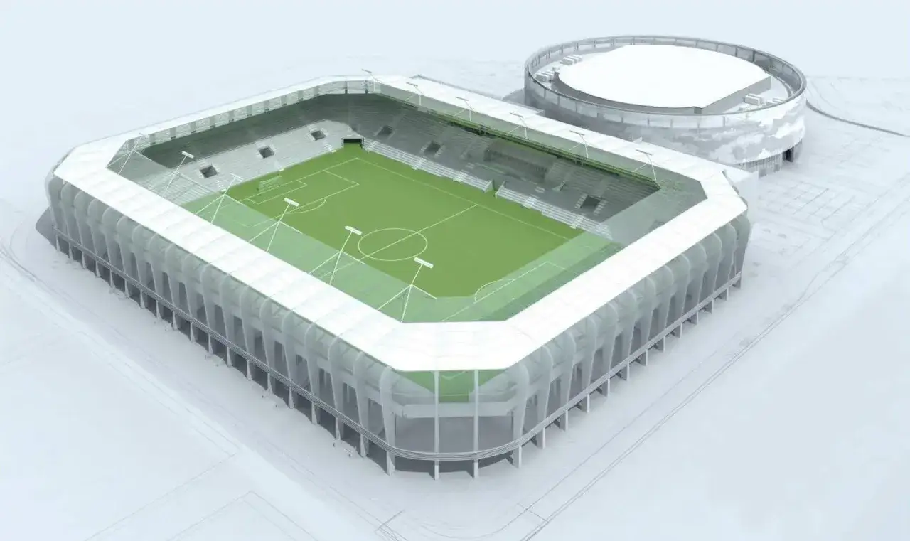 Nowoczesny stadion Radomiaka z zieloną murawą i trybunami. Sektory gotowe na kibiców.